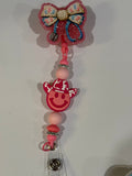 Beaded Interchangeable Badge Reel – “Baby Feet Bow”